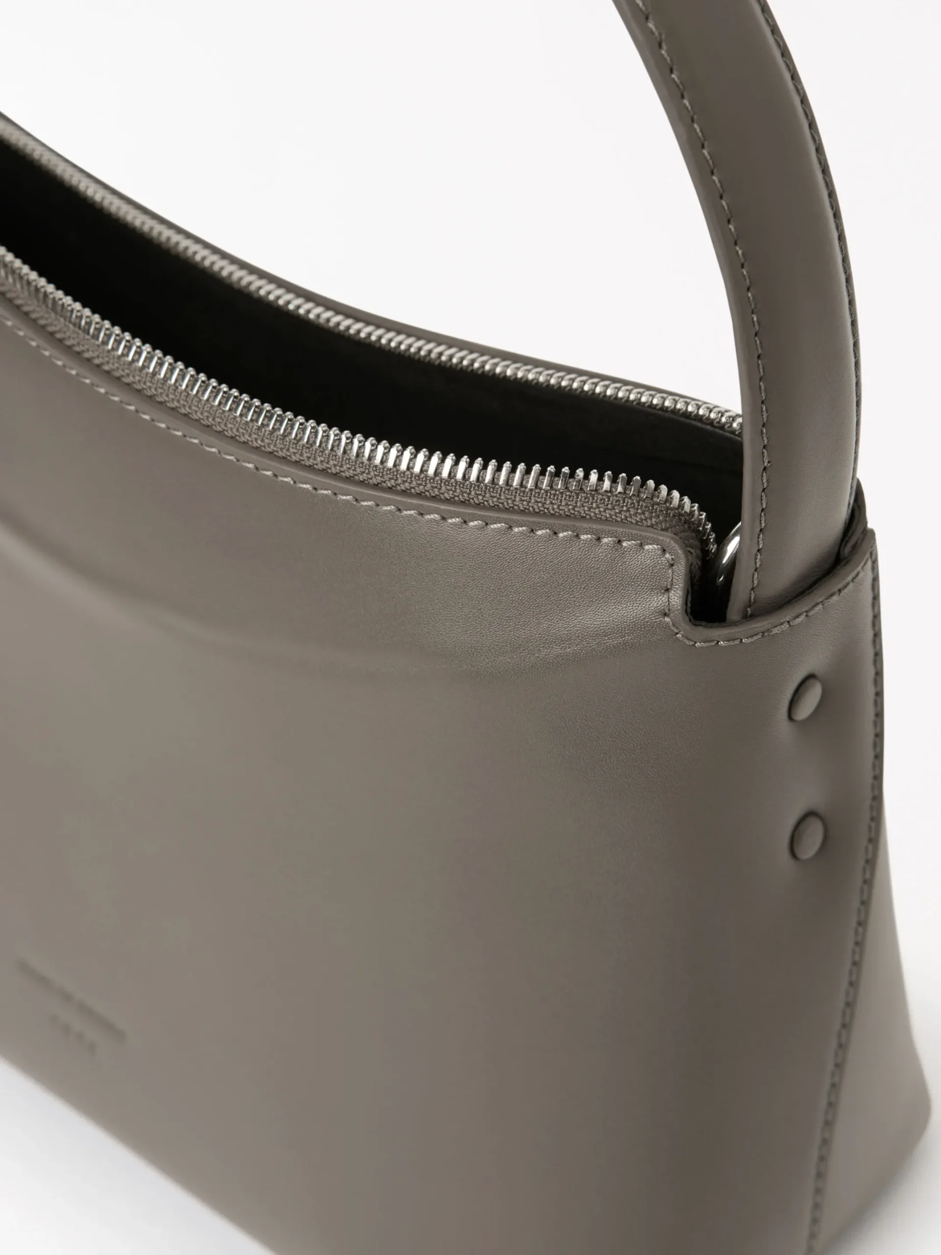 Conci Axelremsväska i Läder